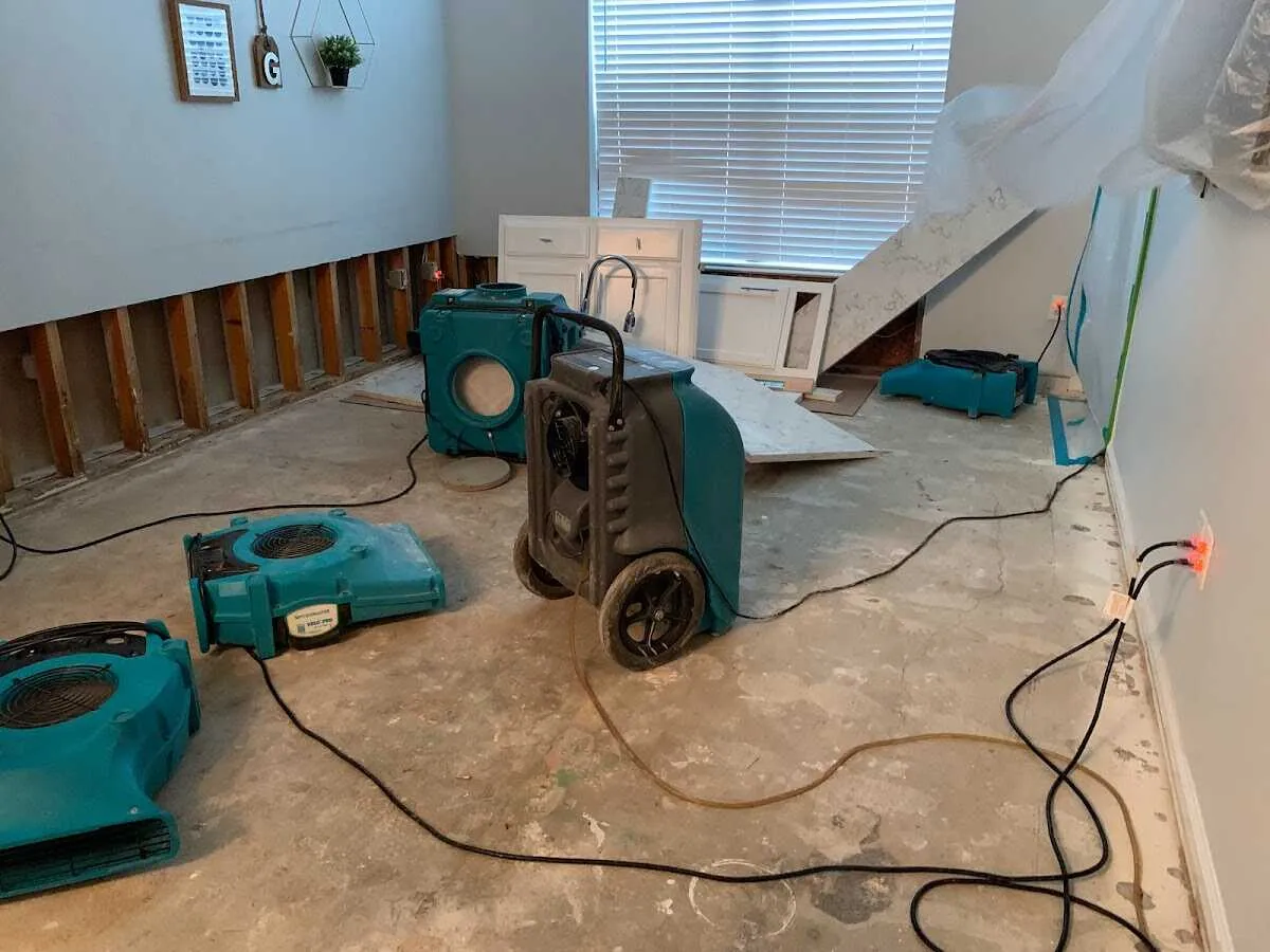 Dehumidifier in flood-cut room for Water Damage Restoration in Rio Grande City